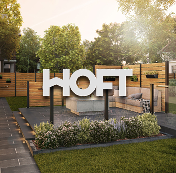 A yard with HOFT fencing enclosing the area.
