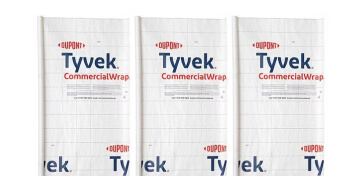 Three rolls of DuPont Tyvek CommercialWrap are shown standing upright, displaying the brand logo and text prominently on a white background.